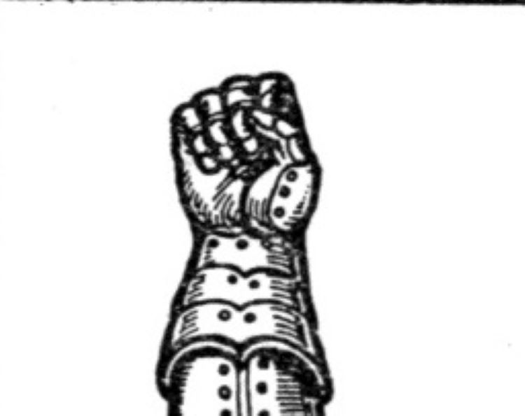 Armoured hand in heraldic gesture