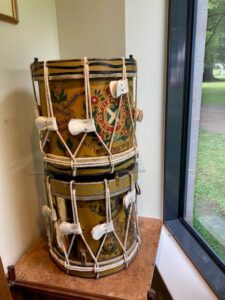 Two drums for a horse regiment, stacked one on top of the other, with painted ornamentation